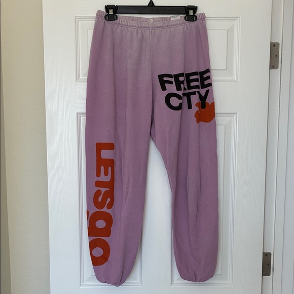 Free City Light Purple Sweatpants with Orange and Black Print - Picture 1 of 7